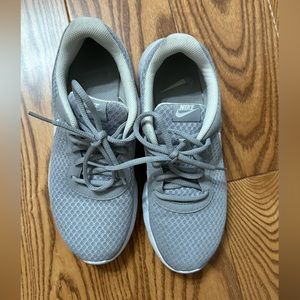 Women’s grey Nike sneakers